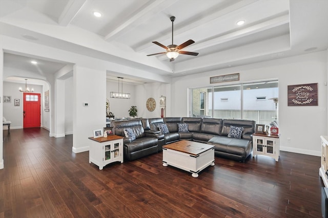 1208 S Pecan Pkwy, Northlake, TX 76247 - living room featuring ceiling fan with notable chandelier, wood-type flooring, beam ceiling, baseboards, and arched walkways