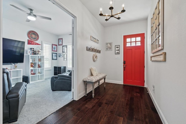 1208 S Pecan Pkwy, Northlake, TX 76247 - entryway with baseboards, ceiling fan with notable chandelier, and hardwood / wood-style flooring