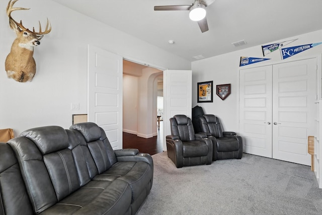1208 S Pecan Pkwy, Northlake, TX 76247 - living room featuring arched walkways, carpet, visible vents, and a ceiling fan