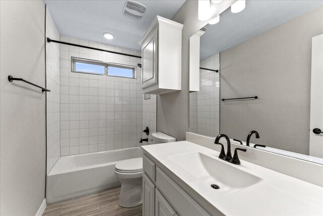 1261 Duke Dr, Prosper, TX 75078 - full bath with toilet, vanity, shower / bath combination, and wood finished floors