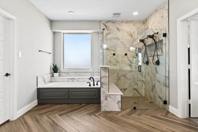 1261 Duke Dr, Prosper, TX 75078 - bathroom featuring a bath, baseboards, visible vents, and a marble finish shower
