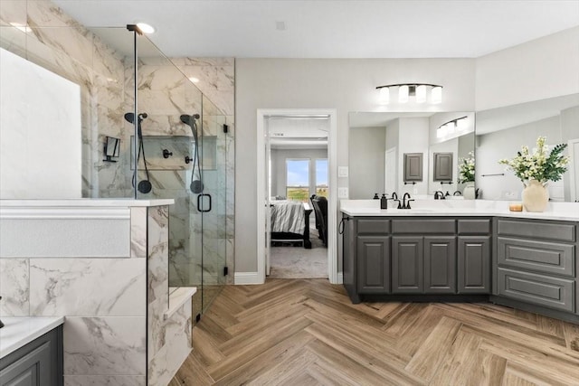 1261 Duke Dr, Prosper, TX 75078 - bathroom with a marble finish shower, baseboards, vanity, and ensuite bath