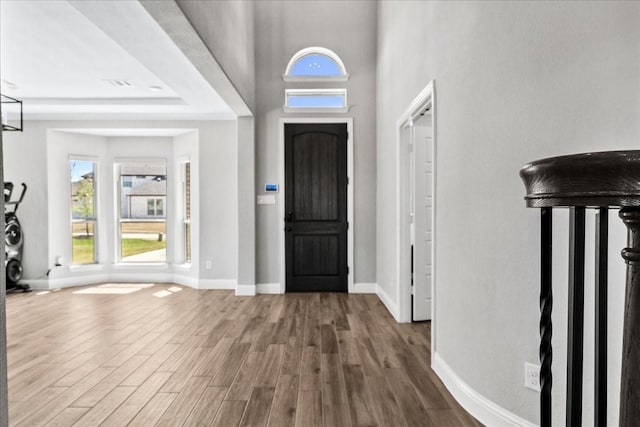 1261 Duke Dr, Prosper, TX 75078 - foyer entrance featuring baseboards and wood finished floors