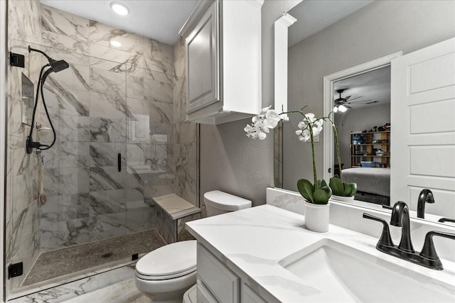 1261 Duke Dr, Prosper, TX 75078 - bathroom featuring toilet, a shower stall, ensuite bathroom, vanity, and ceiling fan