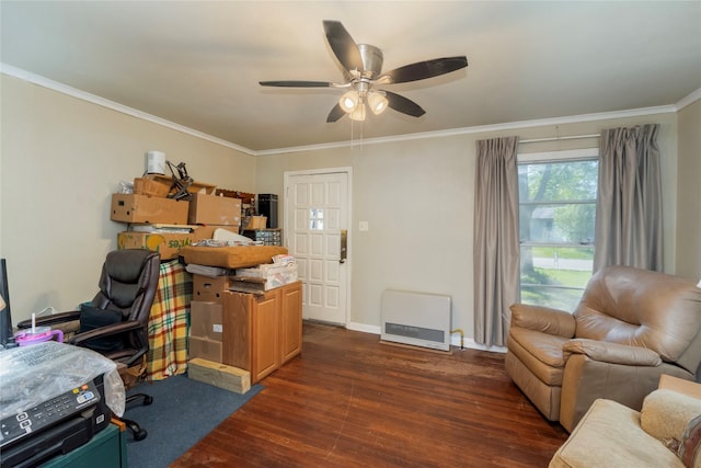 office featuring a ceiling fan, heating unit, dark wood finished floors, baseboards, and ornamental molding
