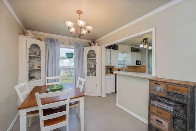 dining space with an inviting chandelier and crown molding