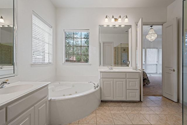 6004 Blossom Ct, Mckinney, TX 75072 - full bathroom with healthy amount of natural light, a whirlpool tub, a shower stall, and two vanities