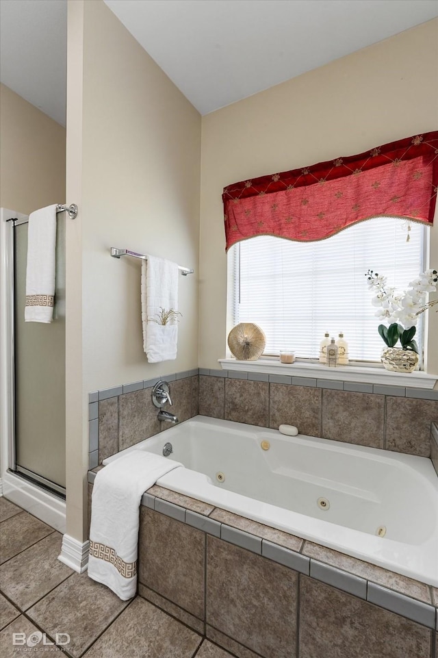 full bathroom with a stall shower, tile patterned floors, a whirlpool tub, and a healthy amount of sunlight