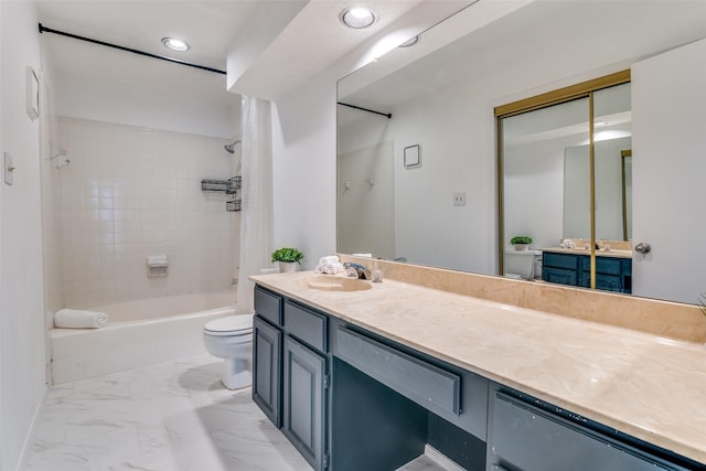 bathroom featuring marble finish floor, toilet, recessed lighting, vanity, and bathing tub / shower combination