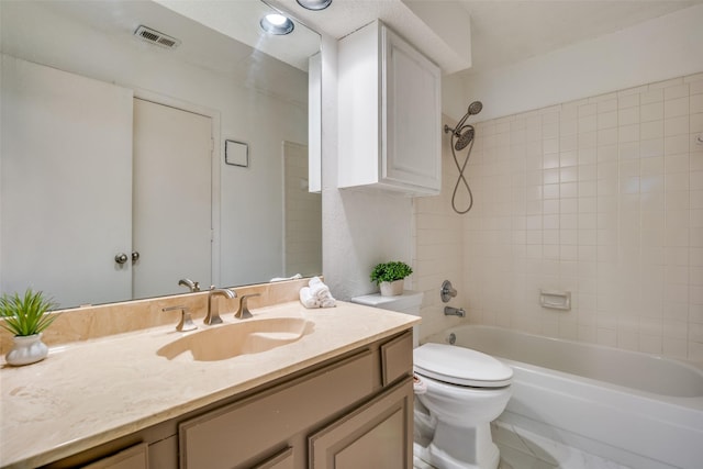 full bathroom featuring visible vents, tub / shower combination, toilet, and vanity