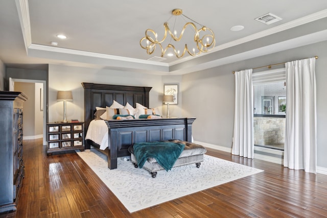 15961 Custer Trl, Frisco, TX 75035 - bedroom featuring a raised ceiling, dark wood-style flooring, ornamental molding, a chandelier, and recessed lighting