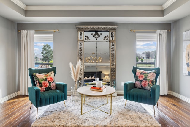 15961 Custer Trl, Frisco, TX 75035 - sitting room with a raised ceiling, crown molding, and hardwood / wood-style floors