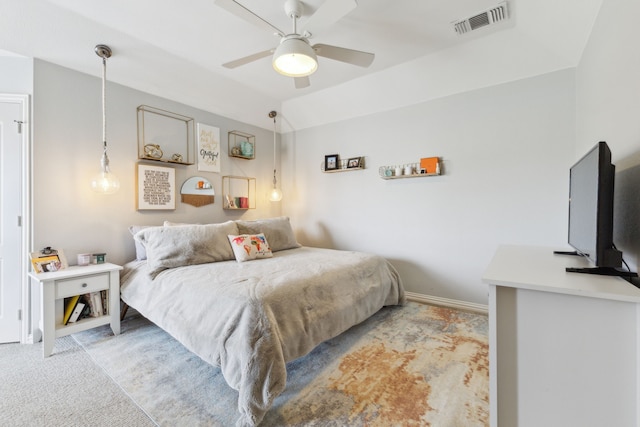 15961 Custer Trl, Frisco, TX 75035 - bedroom with visible vents, baseboards, ceiling fan, and light carpet