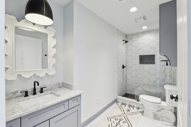 15961 Custer Trl, Frisco, TX 75035 - full bath featuring tile patterned flooring, vanity, a shower stall, and recessed lighting