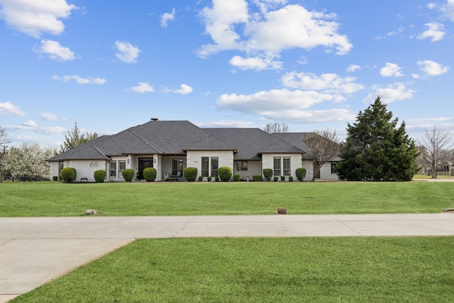 15961 Custer Trl, Frisco, TX 75035 - french provincial home featuring a front lawn, driveway, and roof with shingles