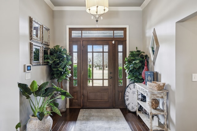 15961 Custer Trl, Frisco, TX 75035 - entrance foyer featuring dark wood-style floors and crown molding