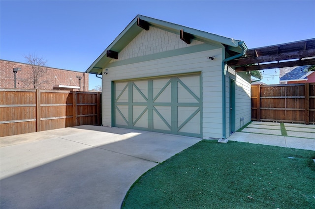 613 E Wall St, Grapevine, TX 76051 - garage with concrete driveway and fence