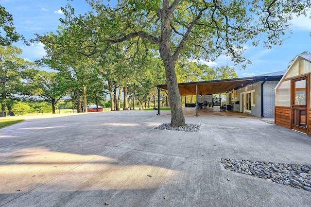 1210 Gordonville Rd, Gordonville, TX 76245 - exterior space featuring driveway and a carport