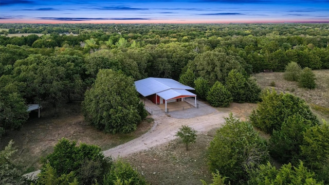 1210 Gordonville Rd, Gordonville, TX 76245 - aerial view at dusk with a wooded view