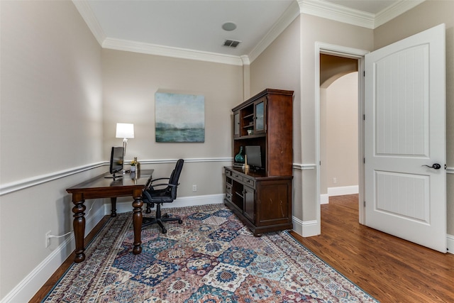 1217 Avondale Dr, Murphy, TX 75094 - office space featuring ornamental molding, arched walkways, wood finished floors, and baseboards