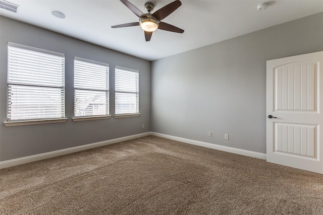 1217 Avondale Dr, Murphy, TX 75094 - carpeted empty room with ceiling fan, baseboards, and a smoke detector