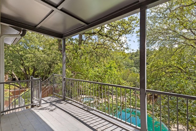 deck with a swimming pool