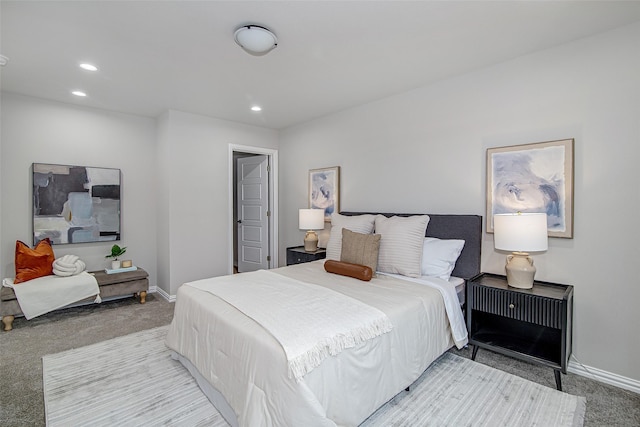 carpeted bedroom with baseboards and recessed lighting