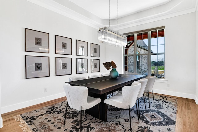 4909 Cheshire Ln, Parker, TX 75002 - dining room featuring an inviting chandelier, baseboards, and wood finished floors