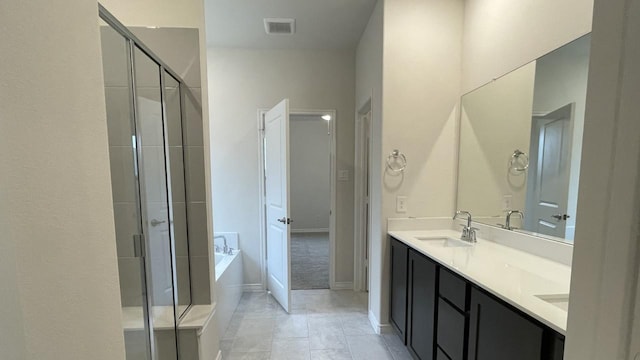 4165 Plateau Dr, Forney, TX 75126 - bathroom with a bath, visible vents, a sink, and a shower stall