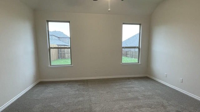 4165 Plateau Dr, Forney, TX 75126 - spare room with plenty of natural light, baseboards, dark carpet, and ceiling fan