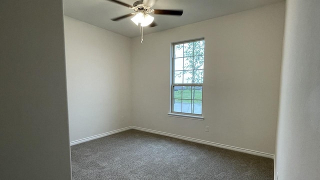 4165 Plateau Dr, Forney, TX 75126 - spare room featuring baseboards, ceiling fan, and dark carpet