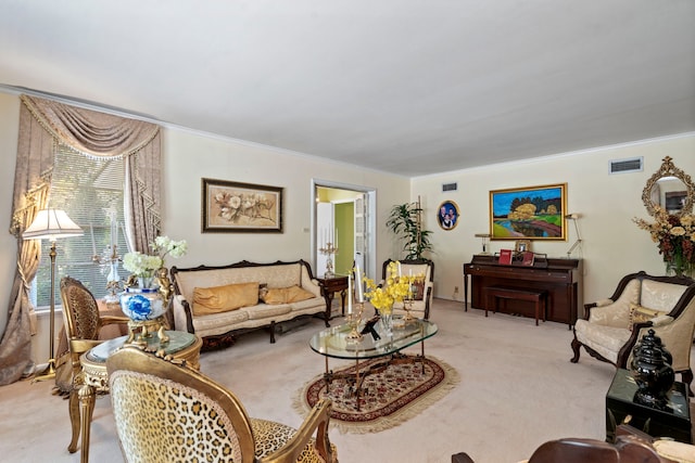 living area with light colored carpet, visible vents, and ornamental molding