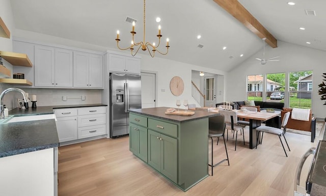 538 Proctor Ave, Waco, TX 76708 - kitchen with green cabinetry, stainless steel fridge with ice dispenser, a sink, open shelves, and beamed ceiling