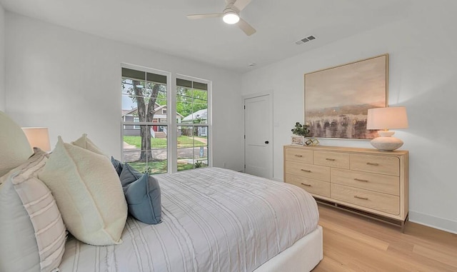 538 Proctor Ave, Waco, TX 76708 - bedroom featuring light wood-style flooring, a ceiling fan, and baseboards