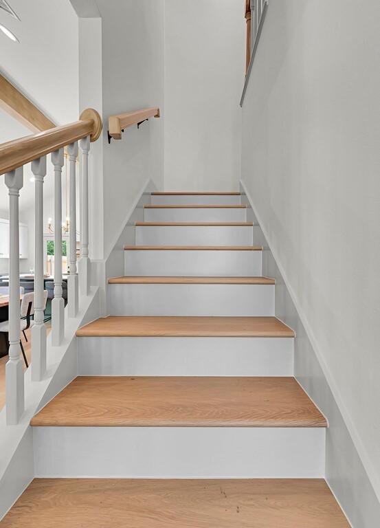 538 Proctor Ave, Waco, TX 76708 - staircase featuring wood finished floors