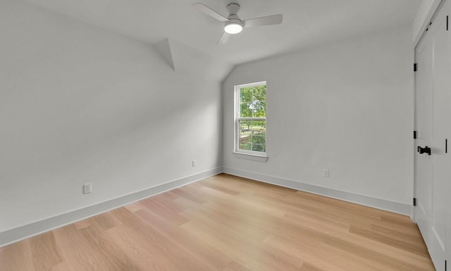 538 Proctor Ave, Waco, TX 76708 - unfurnished bedroom with vaulted ceiling, light wood-style floors, baseboards, and a ceiling fan