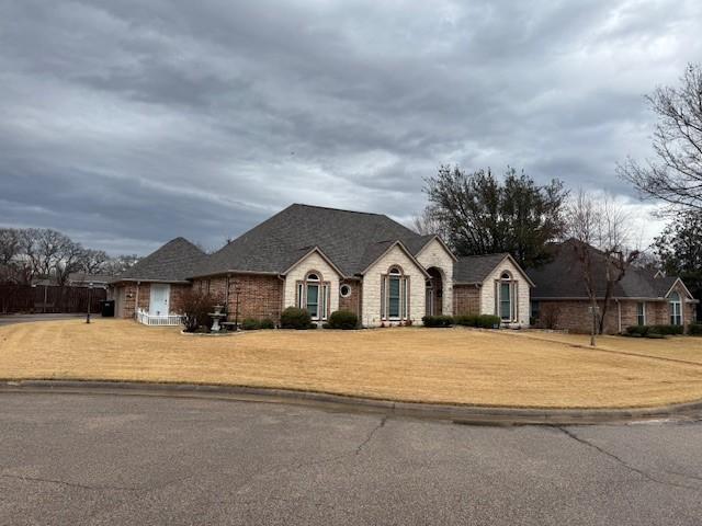 1108 Regent Ln, Greenville, TX 75402 - view of french country inspired facade