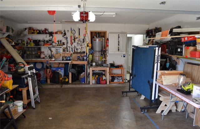 1034 Holland Dr, Garland, TX 75040 - garage with a workshop area and a garage door opener