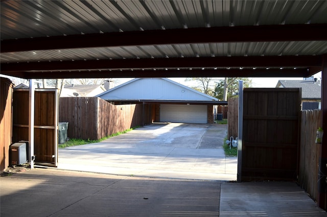1034 Holland Dr, Garland, TX 75040 - garage with a carport and fence