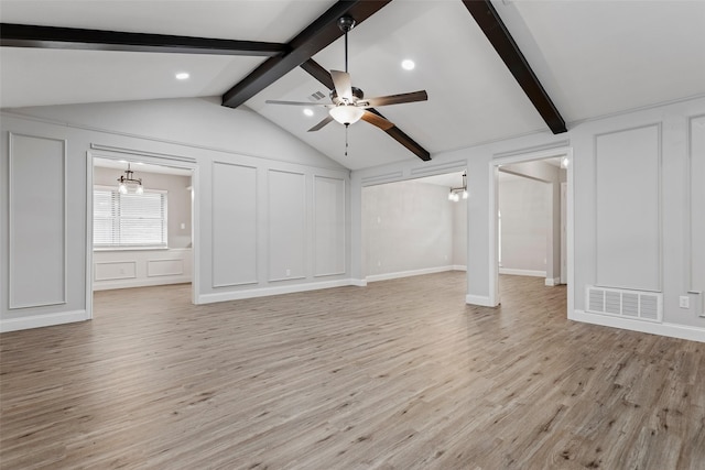 1206 Mayapple Dr, Garland, TX 75043 - unfurnished living room featuring a decorative wall, ceiling fan, light wood-style flooring, visible vents, and vaulted ceiling with beams