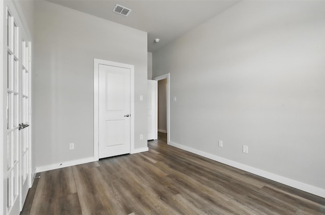 116 Mesa Dr, Glen Rose, TX 76043 - unfurnished bedroom with dark wood finished floors and baseboards