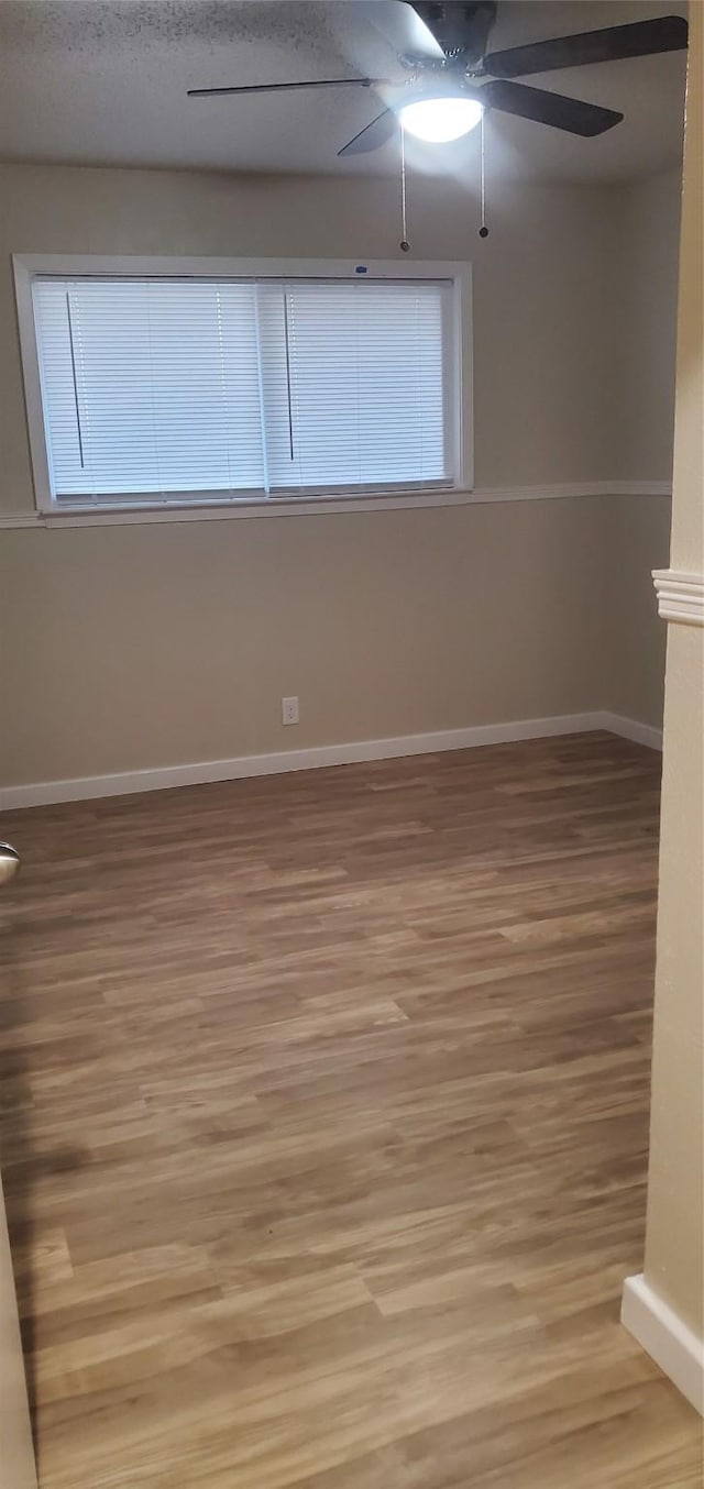 425 Oxford Dr, Sherman, TX 75092 - empty room featuring baseboards, ceiling fan, and light wood finished floors