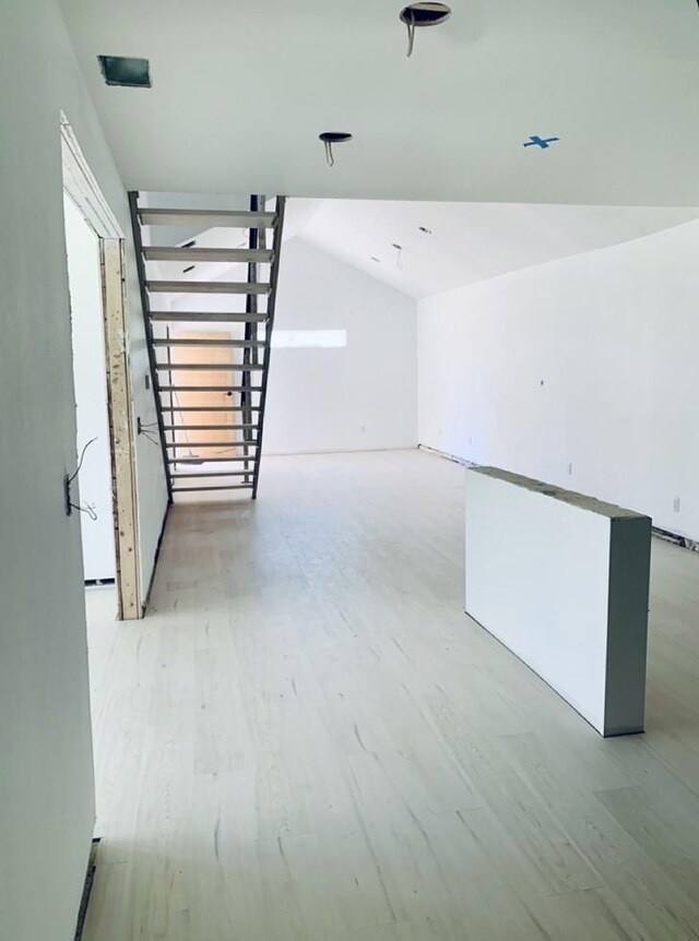 250 Skyview, Point, TX 75472 - empty room with light wood-type flooring and vaulted ceiling
