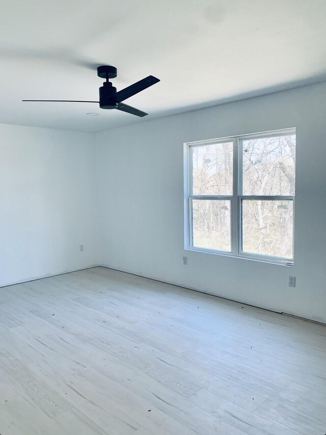 250 Skyview, Point, TX 75472 - empty room featuring healthy amount of natural light, a ceiling fan, and light wood-type flooring
