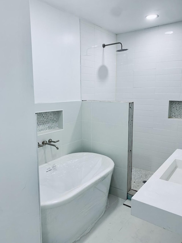 250 Skyview, Point, TX 75472 - full bathroom with a soaking tub, tiled shower, marble finish flooring, and tile walls