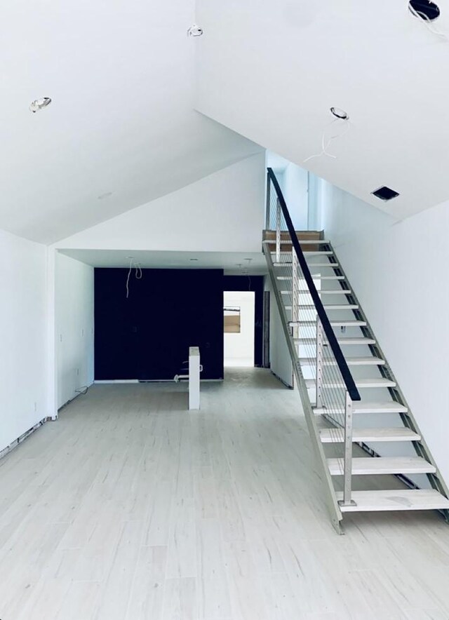 250 Skyview, Point, TX 75472 - stairway with wood finished floors and vaulted ceiling