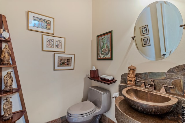 bathroom with a sink and toilet