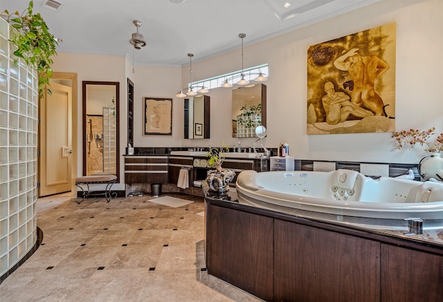 full bathroom featuring visible vents, crown molding, vanity, and a jetted tub