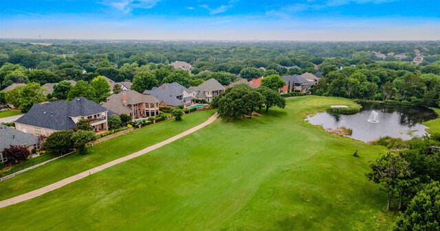 aerial view with a residential view and a water view