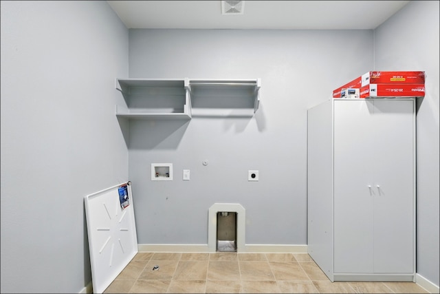 laundry room with laundry area, baseboards, electric dryer hookup, washer hookup, and hookup for a gas dryer
